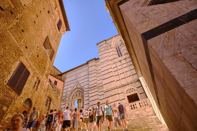Exclusive Siena and San Gimignano Tour & Chianti Wine Experience - Piazza Salimbeni and the Palazzo that hints at Siena’s power
