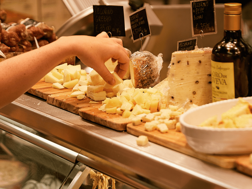 Florence: Cooking Class with Local Food Market Tour - Eating the meal you made, paired with Tuscan wine