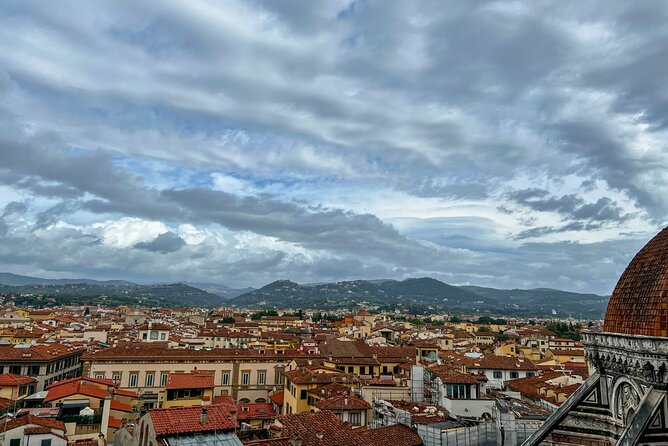 Florence David First Viewing & Duomo with Terrace VIP Access Tour - Inside the Duomo: dome frescoes, a working clock, and stories that stick
