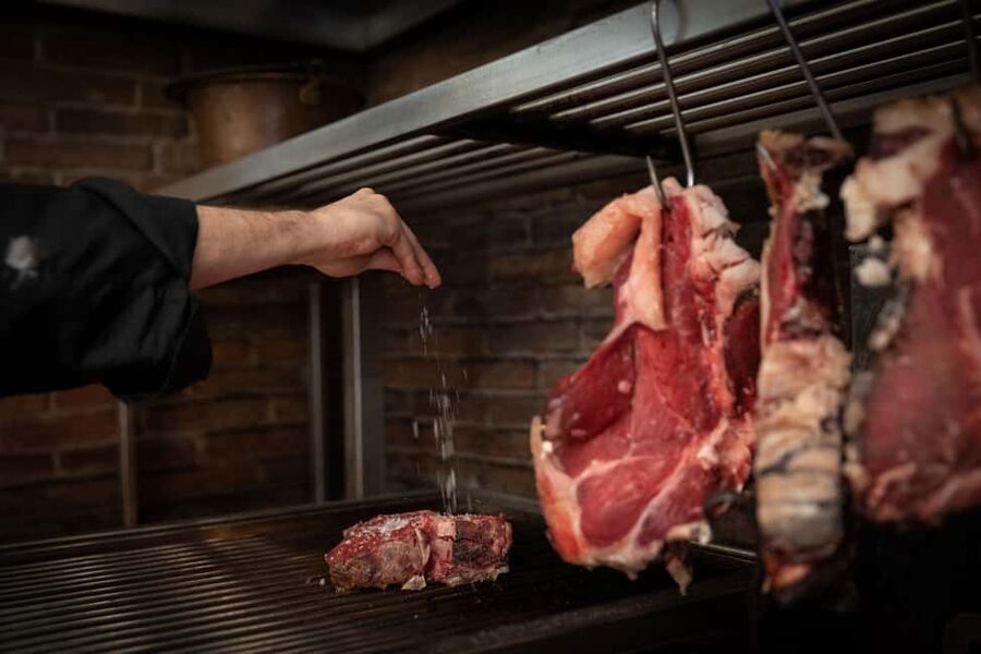 Florence: Live Grill Show & Steak Dinner with Wine - A Steak Dinner Built Around Fire in Piazza Signoria