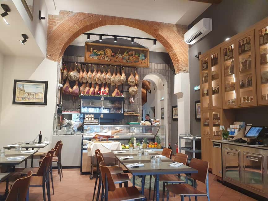 Florence: Live Grill Show & Steak Dinner with Wine - Your Table After the Show: Sizzling Stones, Salad, and Steak Portions