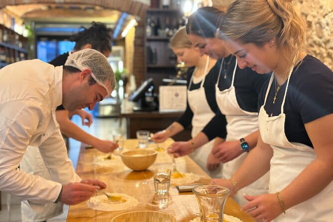 Florence: Tiramisu & Pasta Cooking Class with Unlimited Wine - What to wear, bring, and expect in the room
