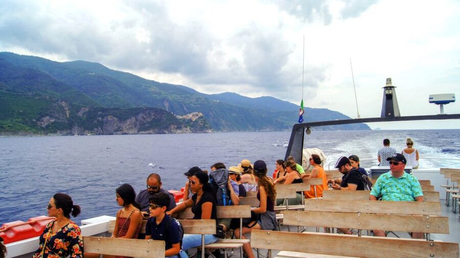 From Florence: Full-Day Private Cinque Terre Tour with Pisa - Vernazza: harbor life, beach time, and pastel squares