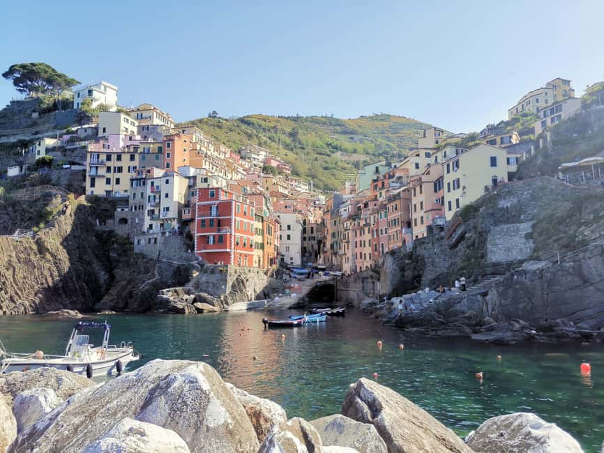 From Florence: Small-group to Cinque Terre and Pisa Day Tour - Riomaggiore: narrow alleys, defensive-castle viewpoints, and swim time