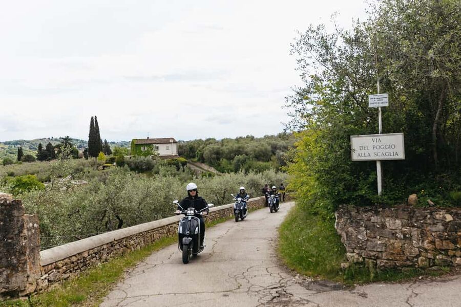 From Florence: Tuscan Countryside Vespa Tour with Tastings - Rolling Out of Florence: Riverside, Skyline Photos, and an Old Church Stop