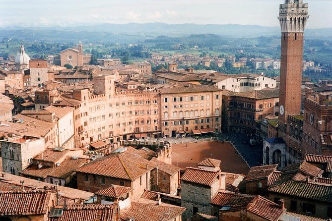 Medieval Tour in Monteriggioni and Val d'Orcia from Florence - Monteriggioni: walking the medieval walls and slowing down in a fortress village