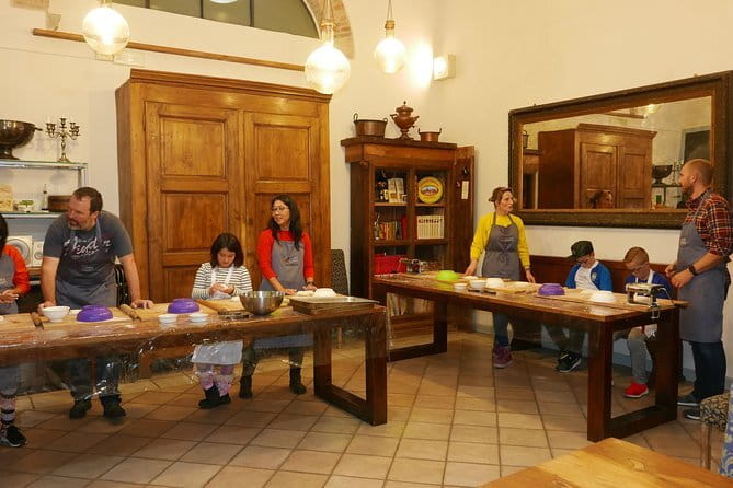 Pizza & Gelato Making Class in Oltrarno with Eating Europe - Pizza time: rolling dough, topping, and learning a Florentine approach