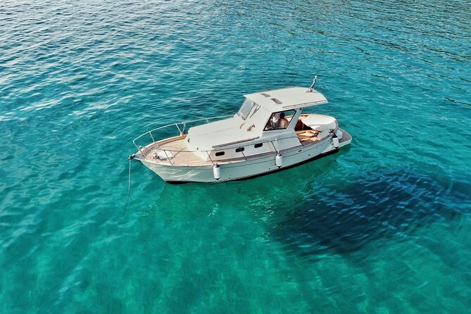 Private Boat Excursion with Lunch or Aperitif to the Calette di Scarlino - Stop 4: Punta Ala Beach and the Shoals of Barbers