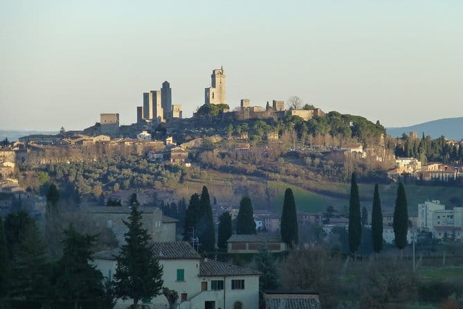 Private Guided E-bike Tour of San Gimignano with Wine Tasting - Walking the UNESCO Town Center: A Guided Stroll That Keeps Moving