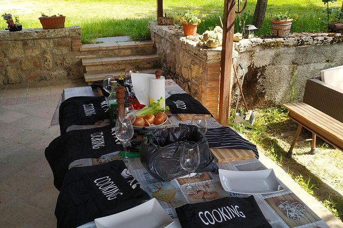 Private Tuscan Cooking Class And Wine Tasting in Radda in Chianti - The meal at the outdoor dining table (and why it’s not just food)