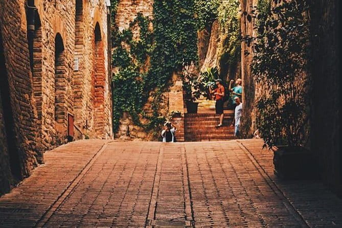 San Gimignano and Volterra Tour by Private Luxury Van - Piazza Duomo to Church Interiors: Santa Maria Assunta and Sant’Agostino Details