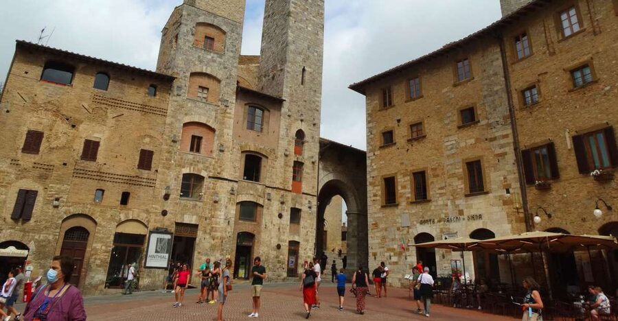 San Gimignano private guide: Manhattan of the Middle Ages - San Gimignano Cathedral: Romanesque exterior, fresco-filled Santa Maria Assunta