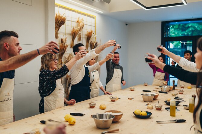 Small-Group Pasta Cooking Class and Market Tour in Florence - Price and Inclusions: Wine, Aprons, and an E-Book