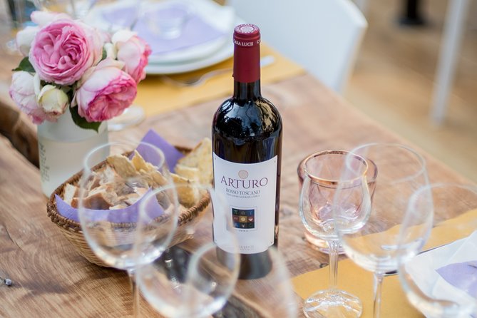 Wine and food tasting in an organic family winery - The estate walk: from vegetable garden to vineyard to olive grove